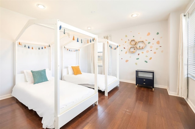 bedroom featuring dark wood-type flooring