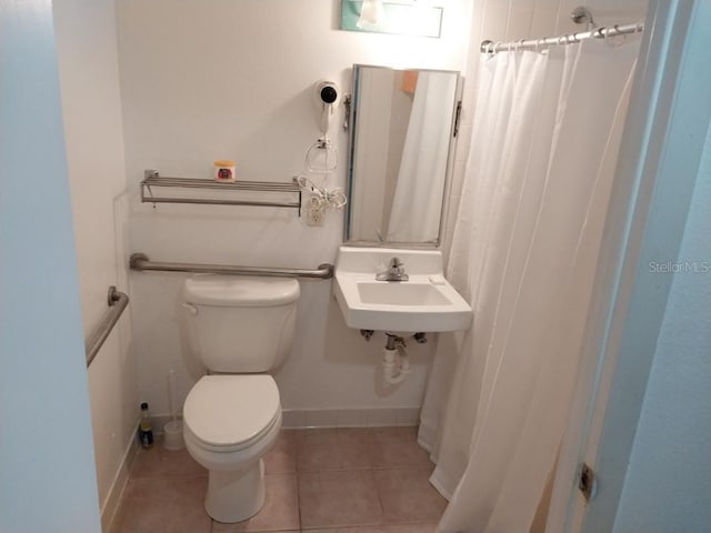 43420 Hwy 27 Unit 361, Davenport, FL 33837 - full bathroom featuring tile patterned floors and a shower with shower curtain