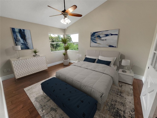 bedroom with high vaulted ceiling, ceiling fan, and dark hardwood / wood-style floors