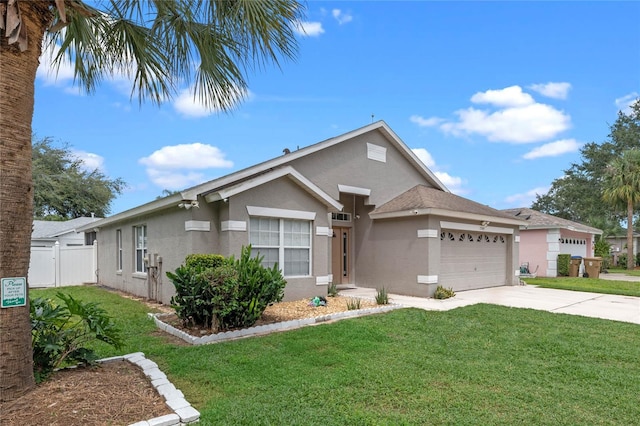 view of front facade with a front lawn and a garage