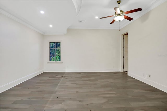 empty room with wood-type flooring, crown molding, and ceiling fan