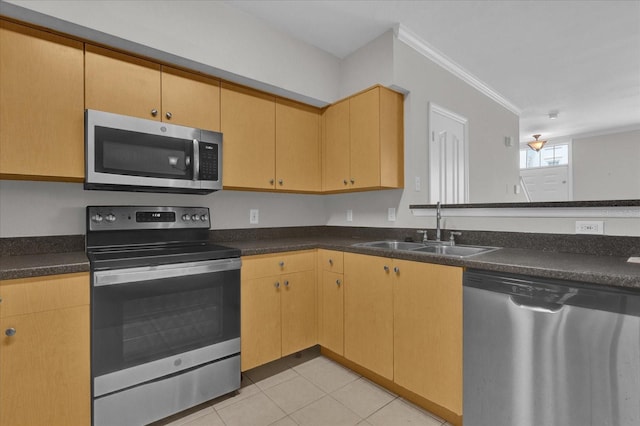 kitchen featuring light brown cabinetry, light tile patterned floors, crown molding, stainless steel appliances, and sink