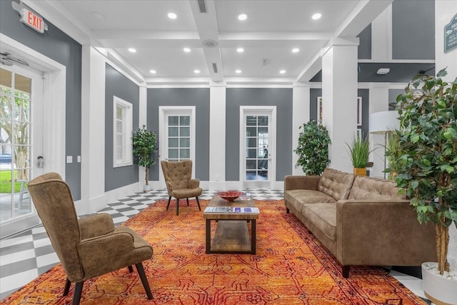 interior space with plenty of natural light, coffered ceiling, and beamed ceiling