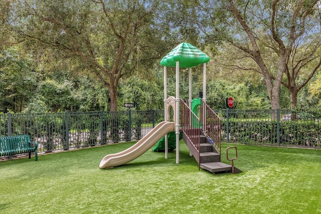 view of playground featuring a yard