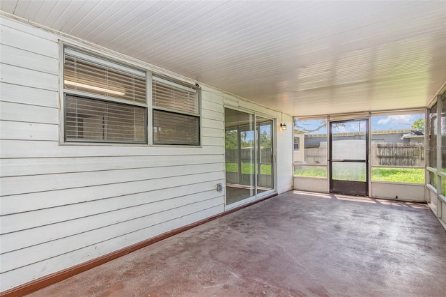 unfurnished sunroom with a healthy amount of sunlight