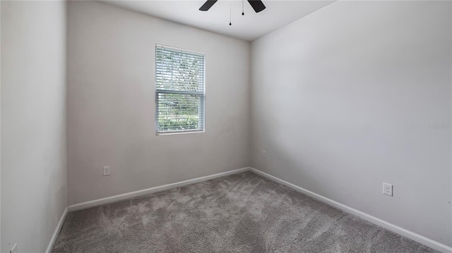 empty room with carpet and ceiling fan