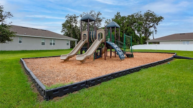 view of jungle gym featuring a yard