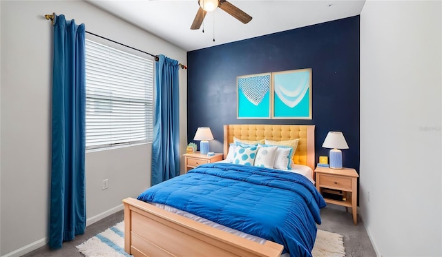 carpeted bedroom with ceiling fan