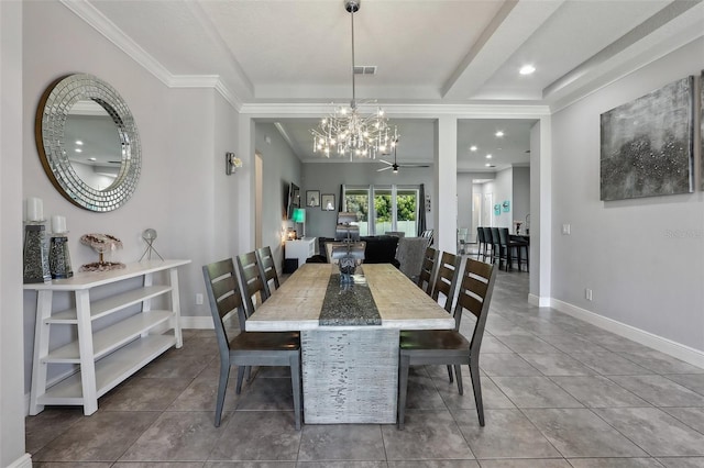 dining area with crown molding, a chandelier, and tile patterned flooring