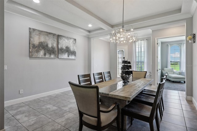 tiled dining space featuring an inviting chandelier