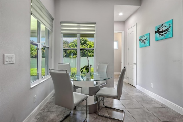 tiled dining area with plenty of natural light