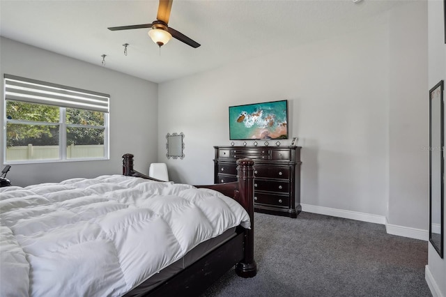 bedroom with dark carpet and ceiling fan