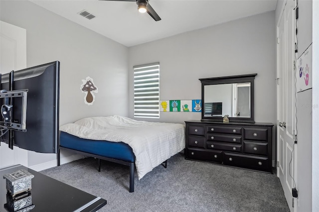 carpeted bedroom featuring ceiling fan