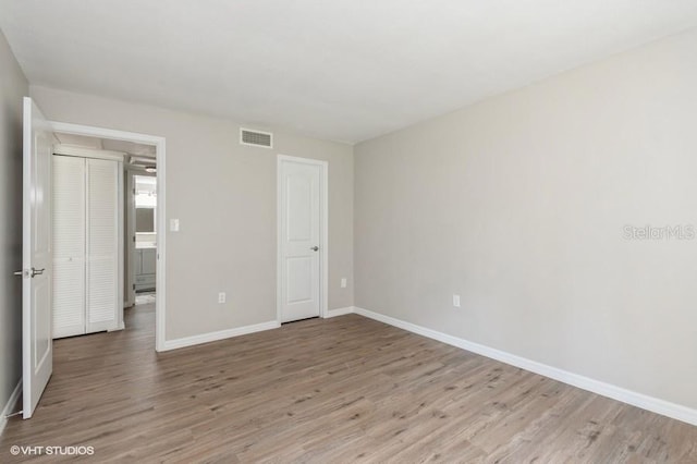 unfurnished bedroom featuring light hardwood / wood-style flooring