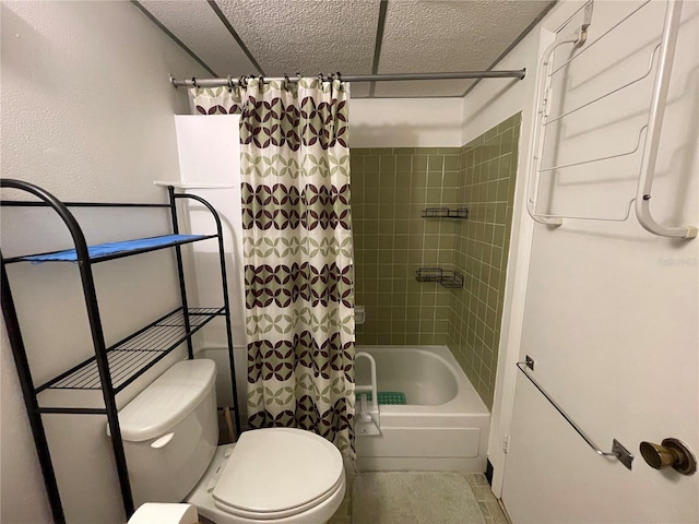 bathroom with tile patterned floors, shower / bath combo, toilet, and a textured ceiling