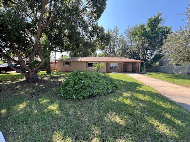 ranch-style house with a front lawn