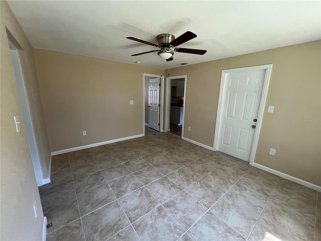 unfurnished room featuring ceiling fan