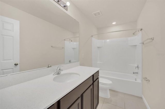 full bathroom with tile patterned flooring, bathing tub / shower combination, vanity, and toilet