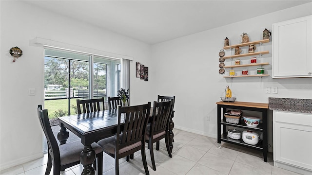 dining room with light tile patterned floors