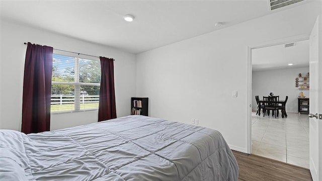 bedroom featuring hardwood / wood-style flooring