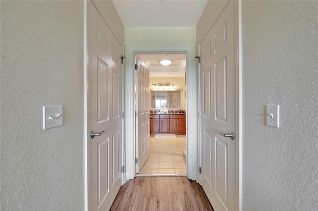 corridor featuring light hardwood / wood-style flooring