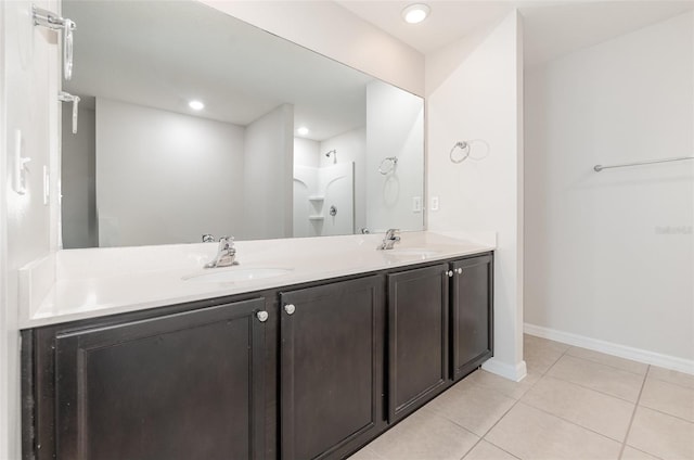 bathroom with vanity and tile patterned floors