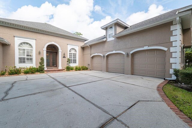 view of front of property featuring a garage