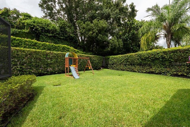 view of yard featuring a playground