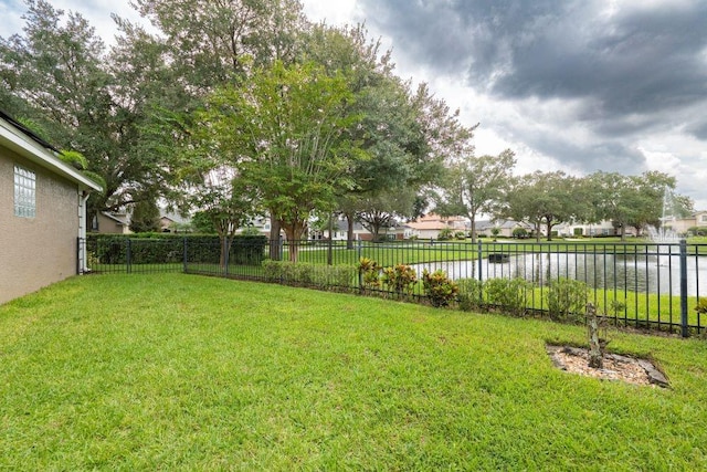 view of yard with a water view