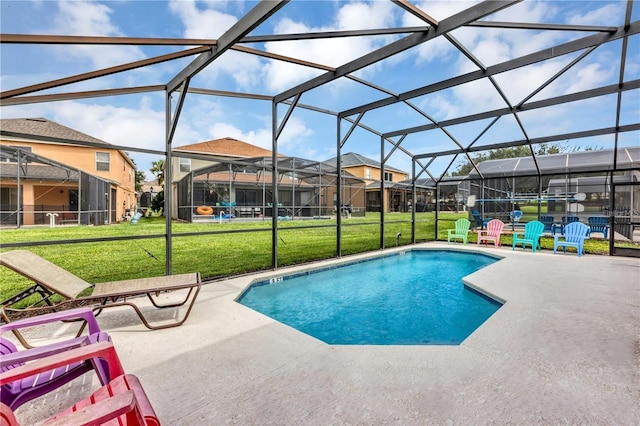 view of pool featuring a lawn, a patio, and glass enclosure