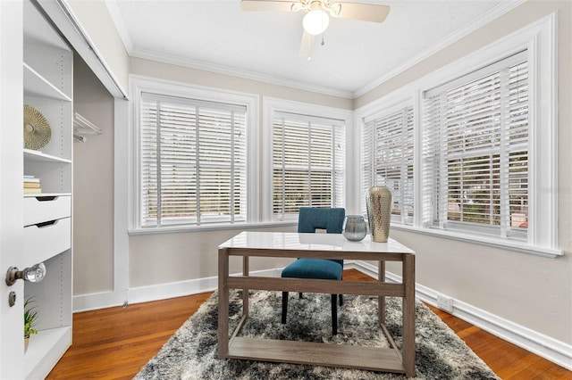 office space featuring crown molding, ceiling fan, and hardwood / wood-style flooring