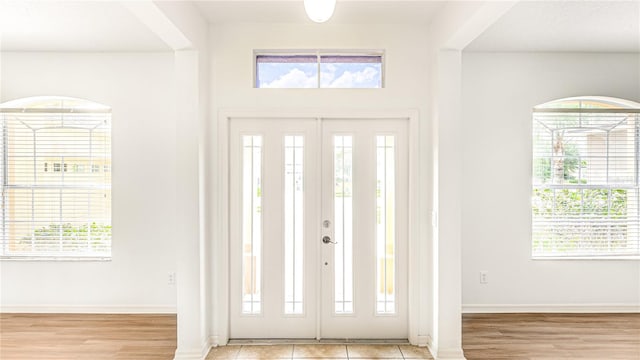 entrance foyer with a healthy amount of sunlight and light wood-type flooring