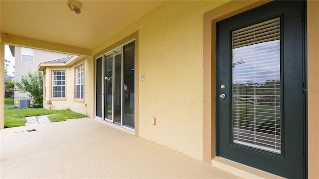 view of patio / terrace with central air condition unit