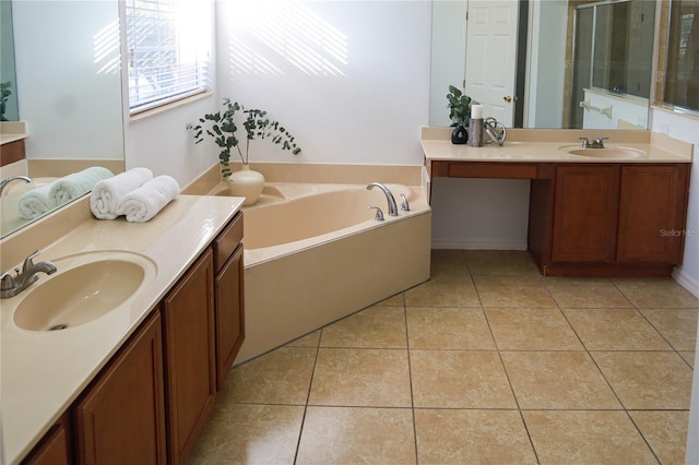 bathroom with tile patterned flooring, vanity, and independent shower and bath