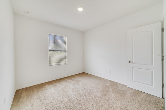 spare room with carpet flooring