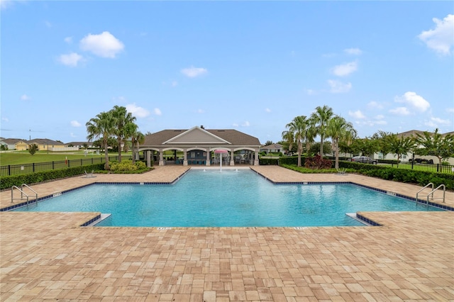 view of pool featuring a gazebo and a patio