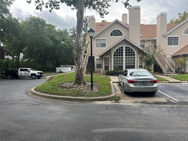 exterior space featuring uncovered parking