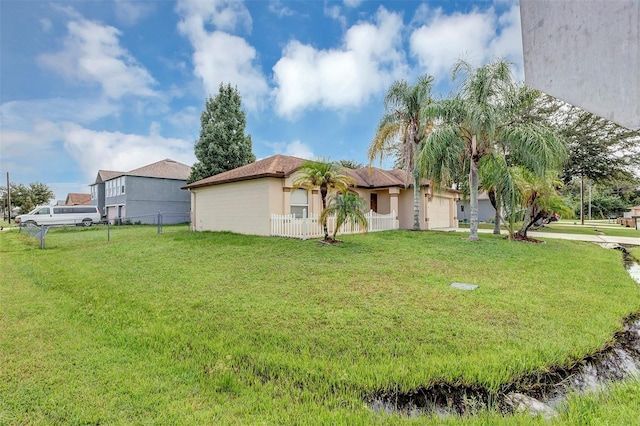 view of yard featuring a garage