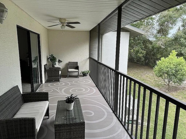 balcony featuring ceiling fan