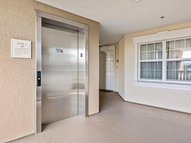 property entrance featuring elevator