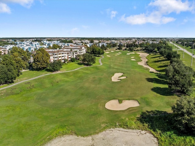 birds eye view of property featuring view of golf course