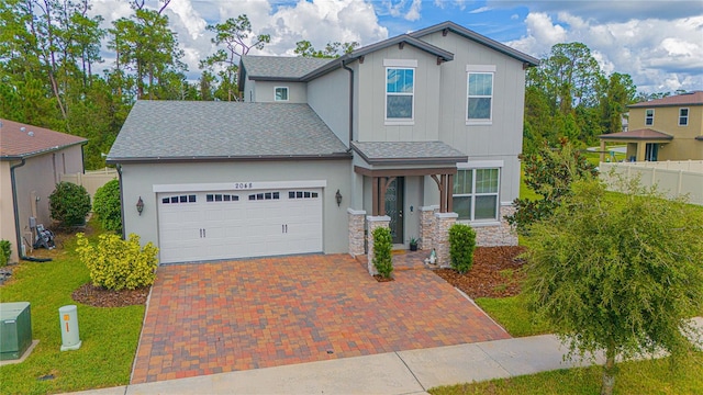 view of front of property featuring a garage