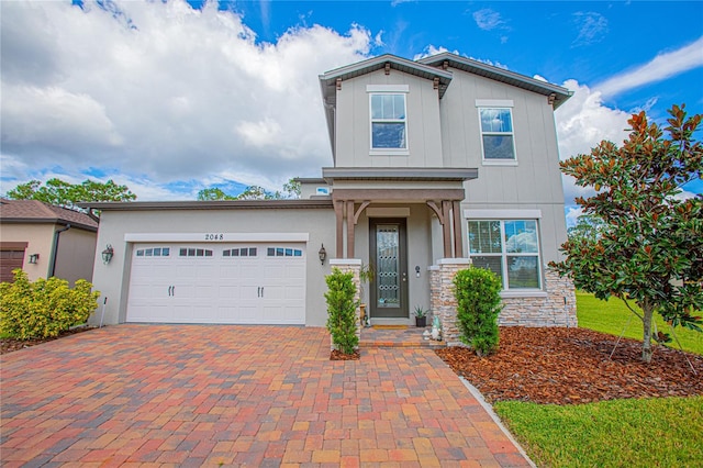 view of front of home with a garage