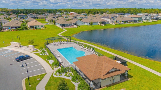 birds eye view of property featuring a water view