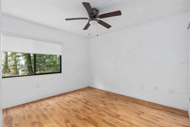 unfurnished room with light hardwood / wood-style flooring and ceiling fan