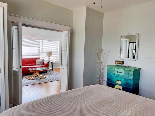 bedroom featuring hardwood / wood-style floors