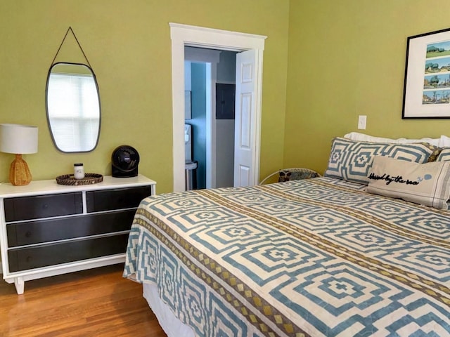 bedroom featuring wood-type flooring