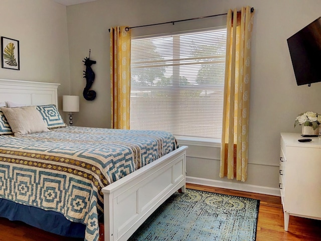 bedroom featuring hardwood / wood-style flooring