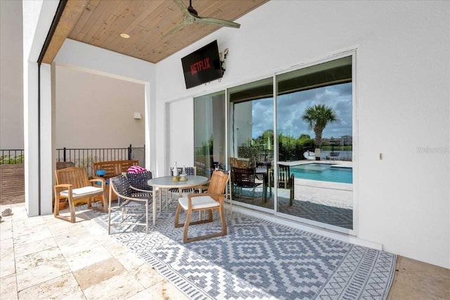 view of patio / terrace featuring ceiling fan