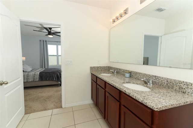 bathroom with vanity, tile patterned floors, and ceiling fan